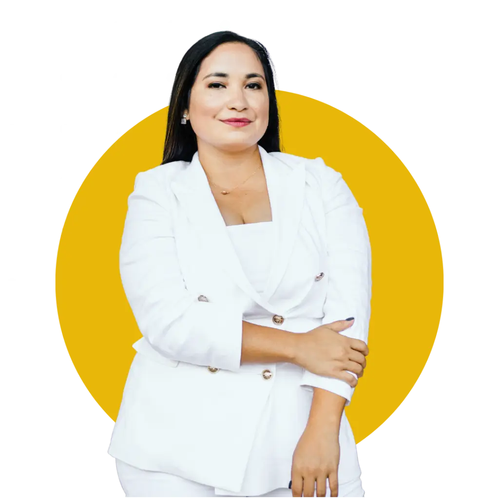 Legalpreneur business coach standing confidently in a white suit and smiling